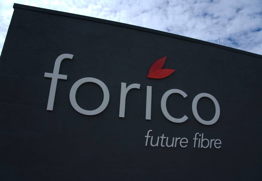 Dark grey coloured sign outside building that reads 'Forico future fibre'